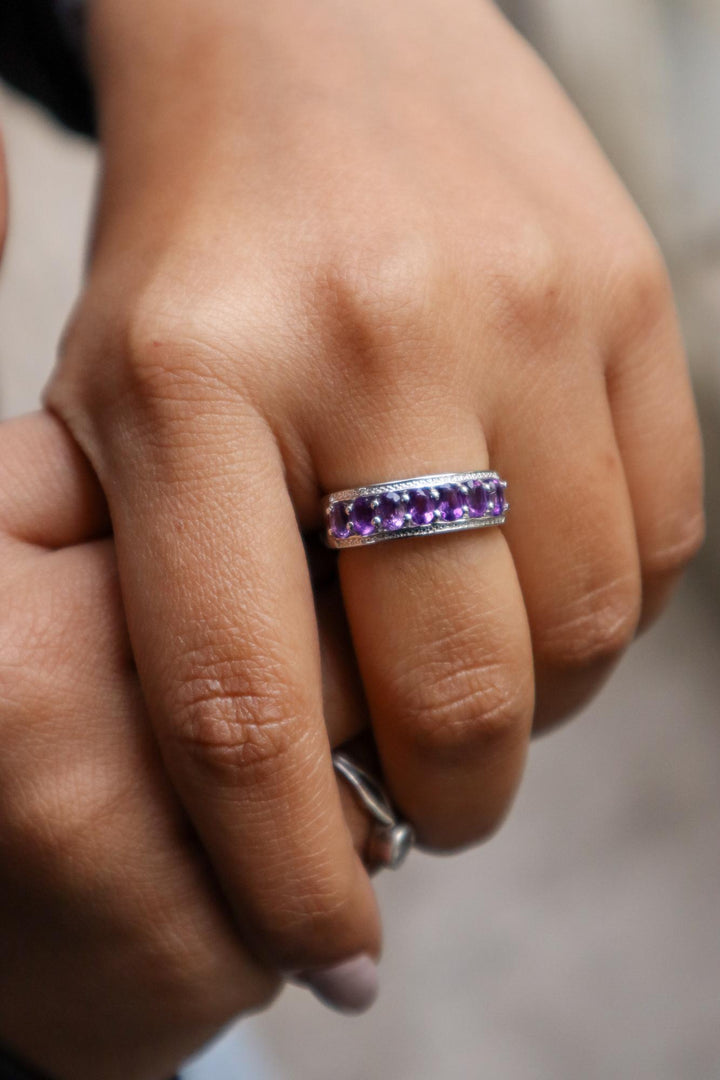 A closeup image of a girl wearing Amethyst Promise Ring -2 by carat For You 