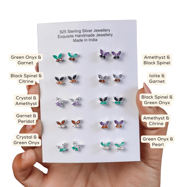 A closeup image of the name of 10 pairs of Butterfly Gemstone Stud Earrings -2 by Carat For You 