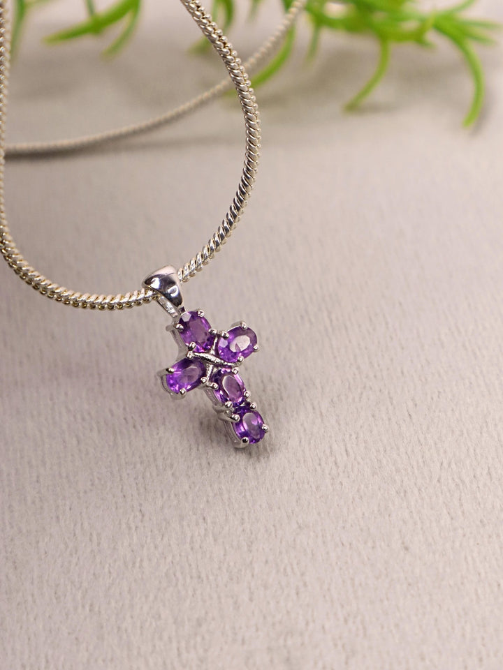  A closeup image of Divine Amethyst Cross Pendant -1 by Carat For You 