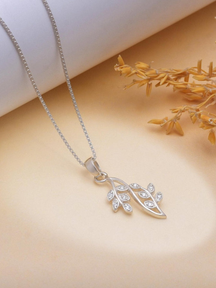 Ella Floral Moissanite Pendant by Carat For You on a creative background