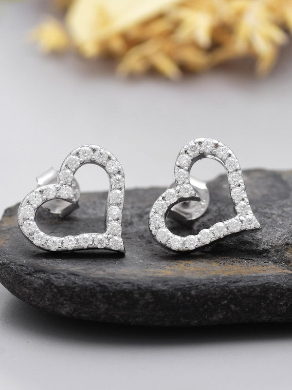 Eternal Sparkle Moissanite Heart Stud Earrings by Carat For You on black rock