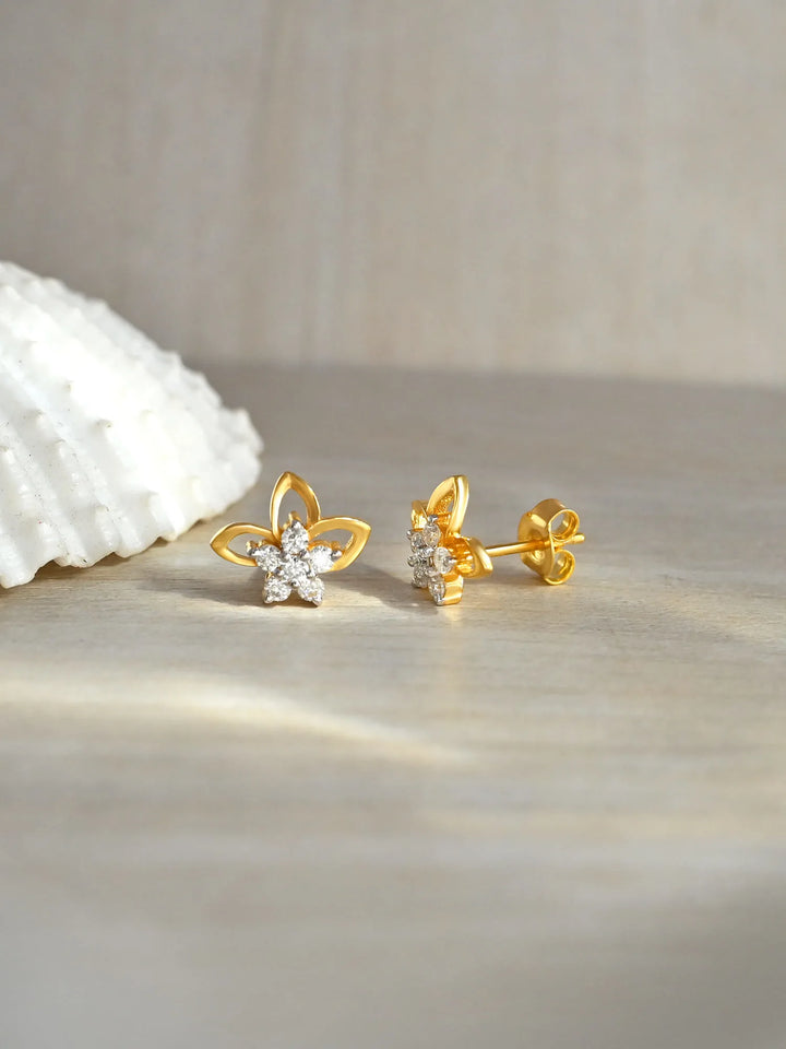 Golden Petal Spark Moissanite Stud Earrings in 925 Sterling Silver by Carat For You on creative background