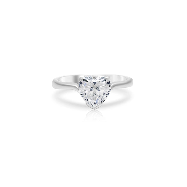 A heart-shaped moissanite gemstone set in a 925 sterling silver ring with rhodium plating.