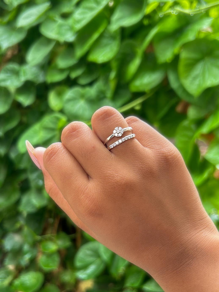 Illusion Dual-Band Cluster Moissanite Ring by Carat For You on Model Hand and natural leaves background
