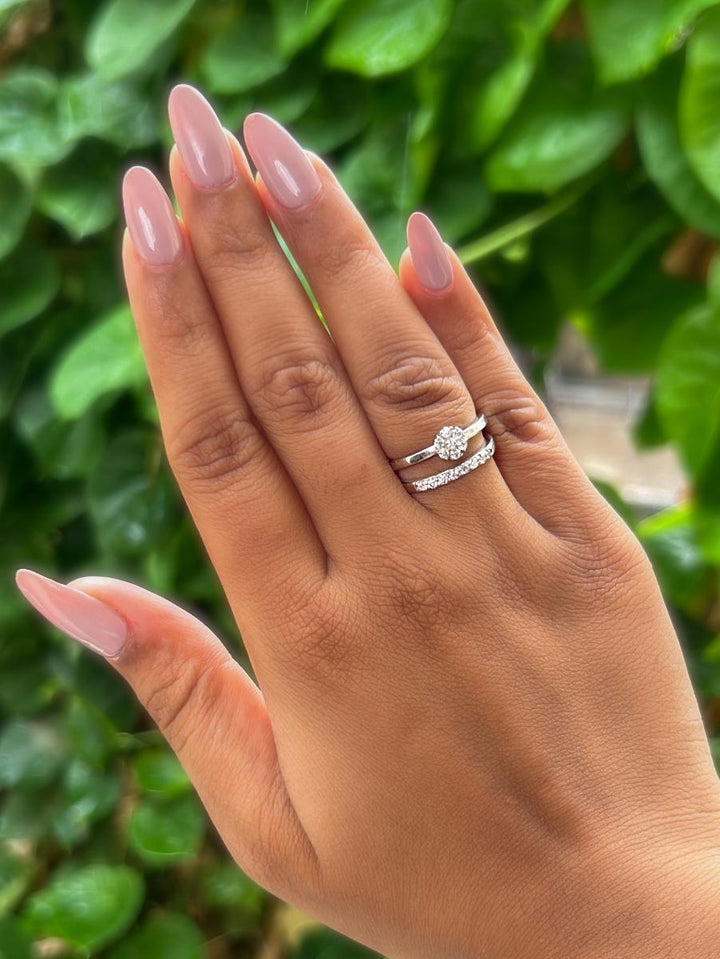 Illusion Dual-Band Cluster Moissanite Ring by Carat For You on Model Hand and natural leaves background