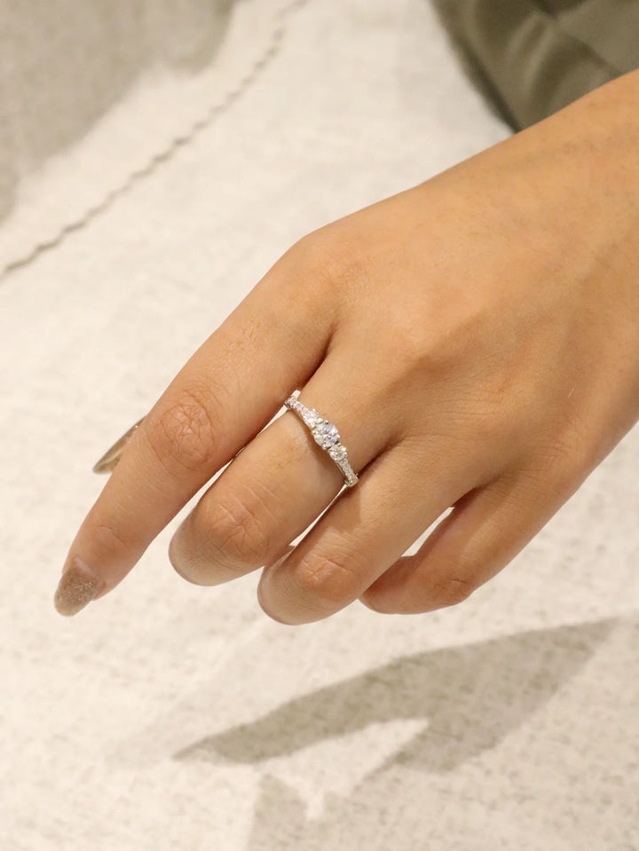 Model wearing Eternal Trilogy Moissanite Engagement Ring in 925 Sterling Silver by Carat For You