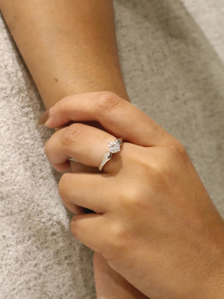 Model wearing Minimal Moissanite Solitaire Ring in 925 Sterling Silver by Carat For You