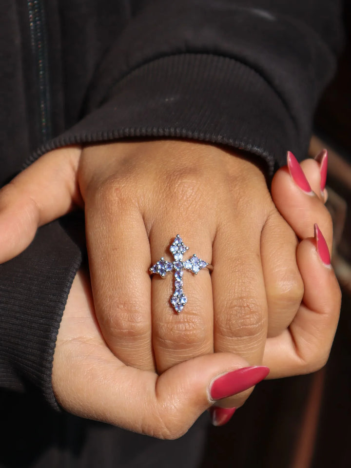 Model wearing Natural Tanzanite Holy Cross Ring in 925 Sterling Silver by Carat For You