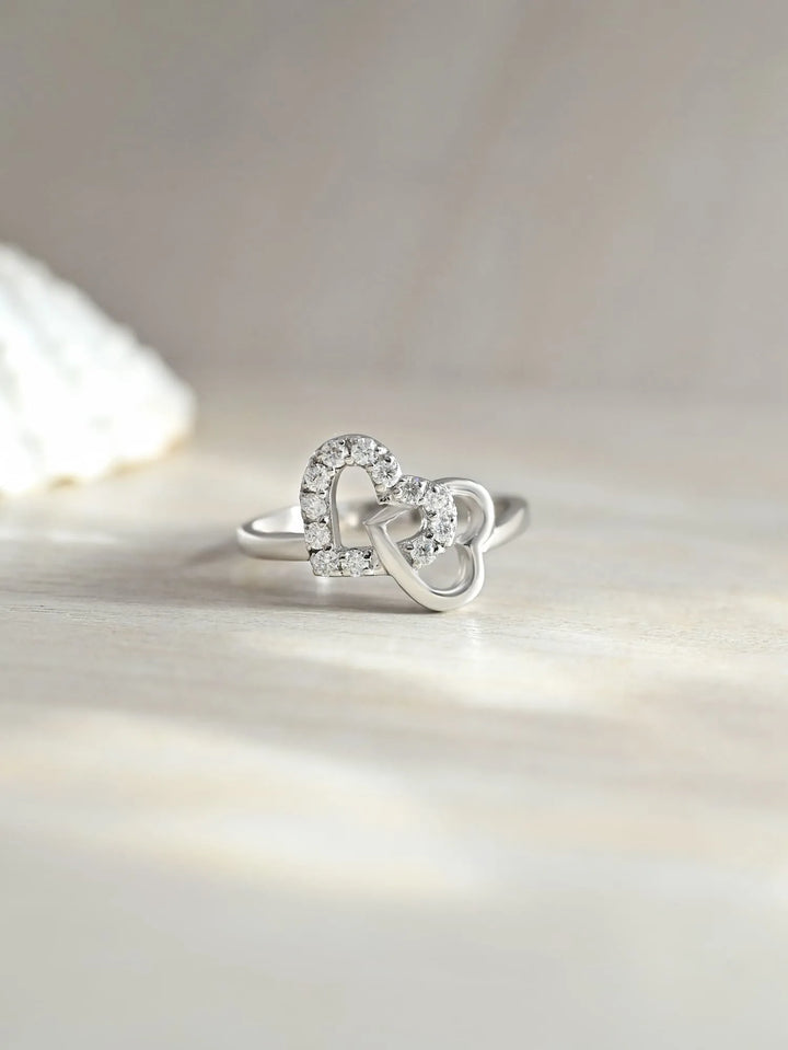 Moissanite Double Heart Ring For Her – 925 Sterling Silver on creative background by Carat For You