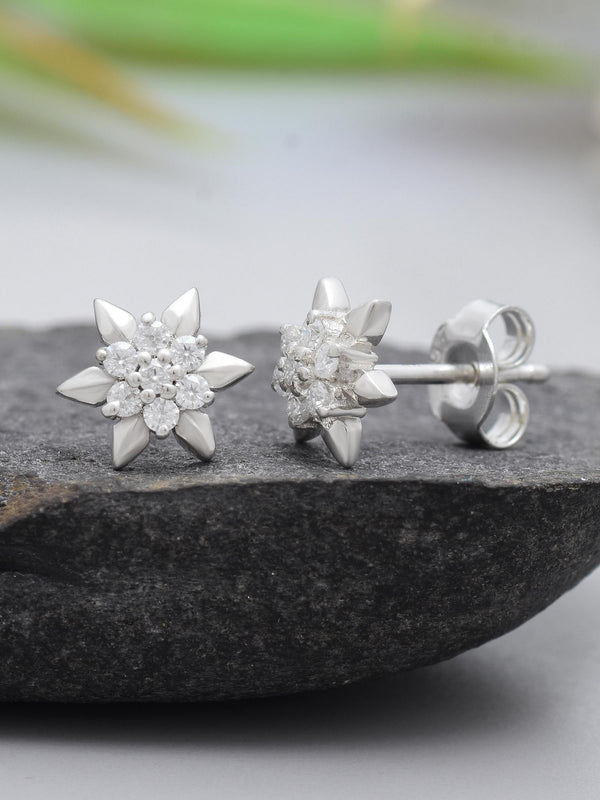 Radiant Bloom Moissanite Floral Stud Earrings by Carat For You on  black rock