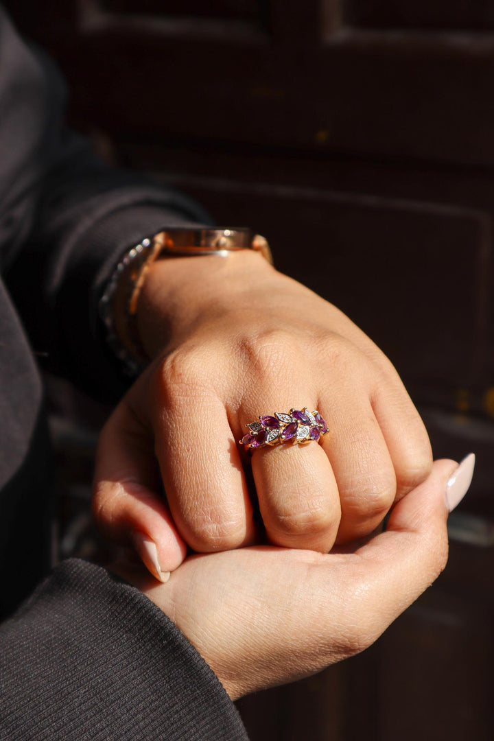 A closeup image of a girl wearing Unique Amethyst Statement RIng -1 by Carat For You