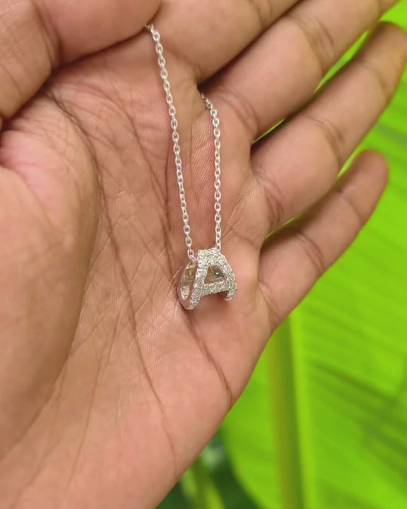 A Letter Initial Personalized Moissanite Pendant Necklace in a creative background video